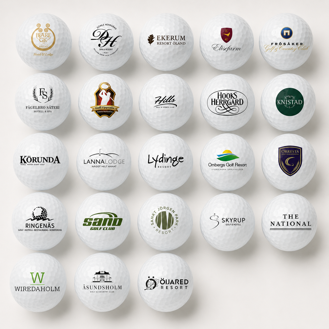 Golfbollar med logotyper från Svenska Golfhotells medlemsanläggningar